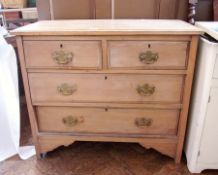 Walnut chest of two short and two long drawers, on shaped bracket feet