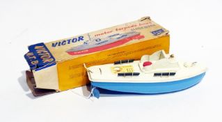 A Sutcliffe tinplate clockwork model of a Victor motor torpedo boat (boxed)