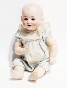 F.S. and Co German bisque-headed baby doll, marked 1255/35, with blue fixed eyes, open mouth,