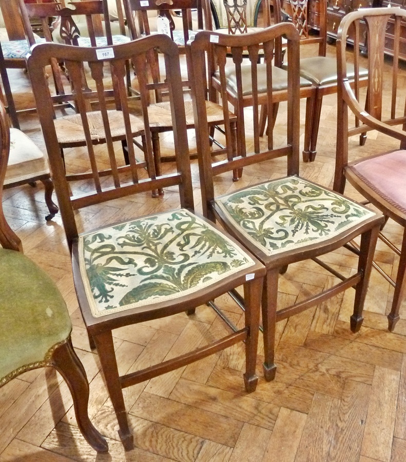 Inlaid Edwardian open arm occasional chair, the shaped arched back with Art Nouveau inlaid central