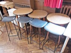 Three melamine-top pub tables and four padded-top high stools with black metal frame supports