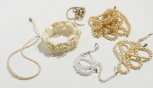 A quantity of costume jewellery to include:- imitation pearl necklaces, bead necklaces and