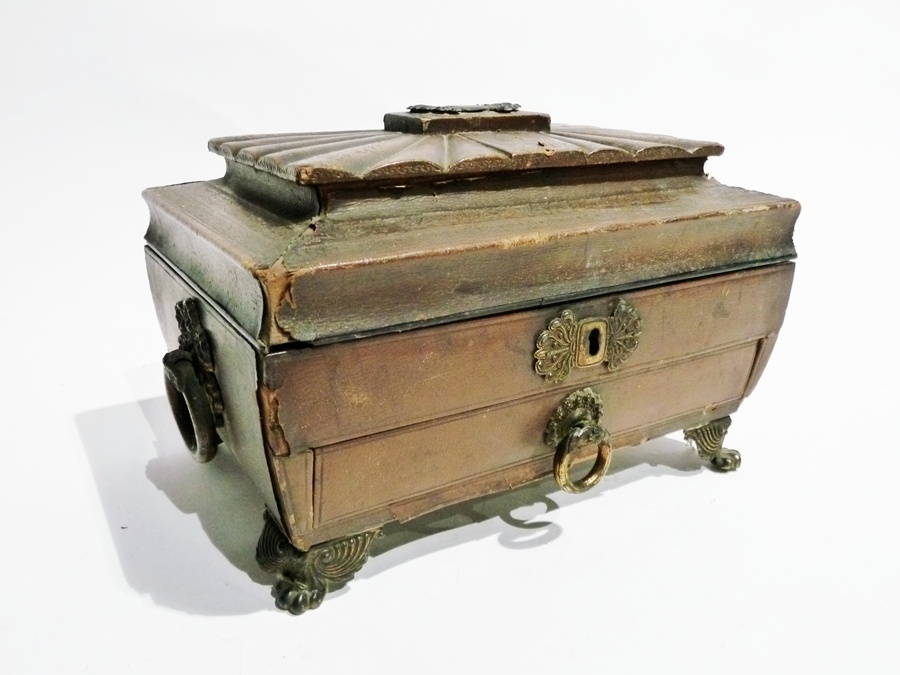 A 19th century leather worked sewing box, sarcophagus-shaped, hinged lid enclosing compartments with