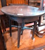 Victorian mahogany revolving top occasional table, with screw mechanism on turned supports