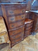 Reproduction mahogany bowfronted narrow chest on  chest, having three short drawers and three