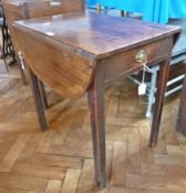 A 19th century mahogany pembroke table, with frieze drawer, raised on square chamfered legs, width