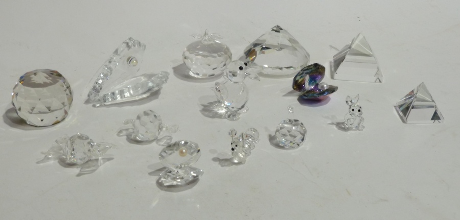 Quantity Swarovski style cut glass miniatures including:- animals, clam shells, spheres, pyramids