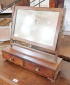 A Georgian mahogany rectangular swing-frame dressing table mirror, with reeded supports to box