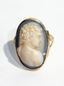 An oval cameo ring of a classical boy, in a gold metal mount