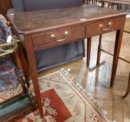 Antique oak side table, rectangular with curved fore-corners, two frieze drawers with brass drop