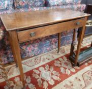 Edwardian mahogany side table of single frieze drawer, pair brass stamped handles, on square