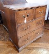 A Georgian oak chest of two short and two long drawers, brass swan-neck handles, raised on bracket