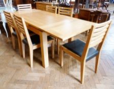 A contemporary light oak drop-leaf dining table on square legs, six ladderback single chairs, length