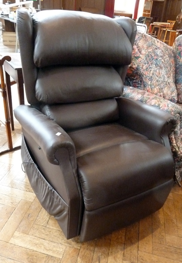 Leather reclining electrically operated wing armchair