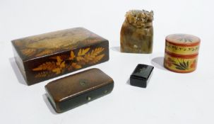 A Georgian horn(?) snuff box and another black lacquered snuff box, a small soapstone group and a