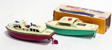 A Sutcliffe tinplate clockwork toy Sprite day cruiser (boxed) together with a Sutcliffe pilot