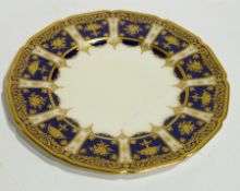 Tiffany & Co Royal Doulton plate, cream with ornate royal-blue and heavily gilded border,