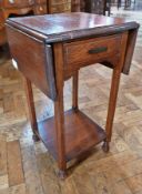 Art Deco oak folding occasional table, with drop-ends with single drawer and shelf below, on