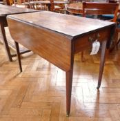 George III mahogany pembroke table, with frieze drawer, on turned tapering square legs with brass