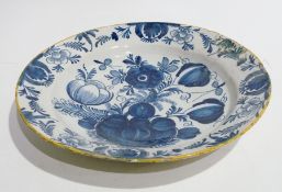 Early Delft pottery plate, stylised floral decorated with yellow border, 31cm diameter (af)