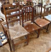 Arts and Crafts style oak rush-seated ladderback chair and two early 20th century bedroom chairs