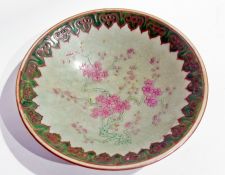 Chinese celadon porcelain bowl enamelled with pink prunus to the centre, green scroll enamelled