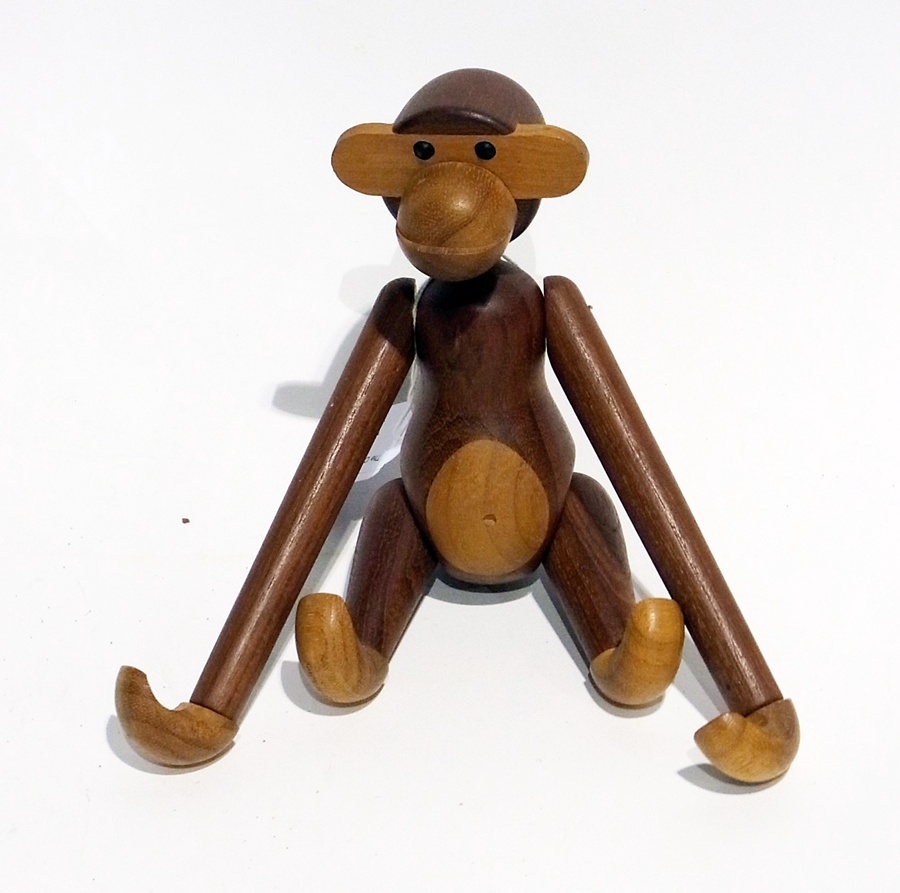 A Kay Bojesen teak and limba wood articulated swinging monkey, 20cm high