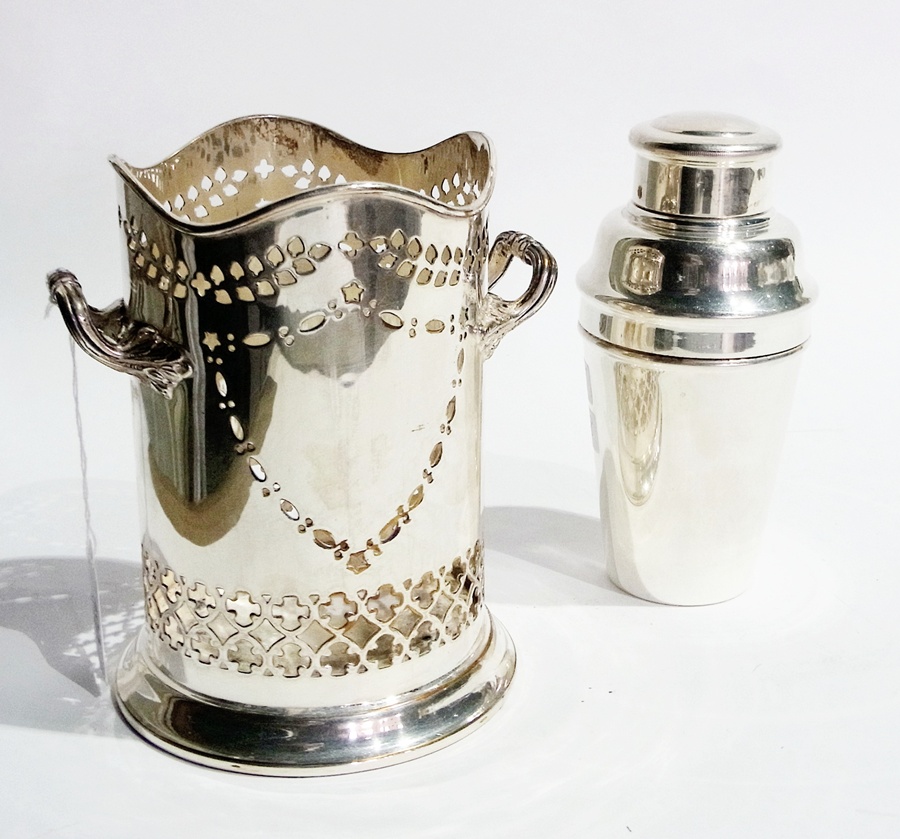 An EPNS cocktail shaker together with a silver plate bottle holder and a three-division shell-shaped