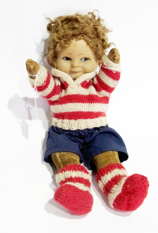 Chad Valley 'Bambina' felt boy doll, with fixed brown eyes, brown curly hair, wearing red and