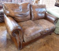 Victorian style brass studded leather two-seater club sofa, in brown leather with loose seat and