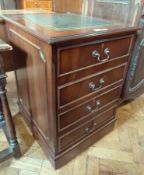 A modern reproduction mahogany filing cabinet, with dummy front drawers, an inset leather writing