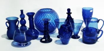 Quantity of blue glass to include:- pair of wine glasses, five vases, two mugs, cup, candlestick,