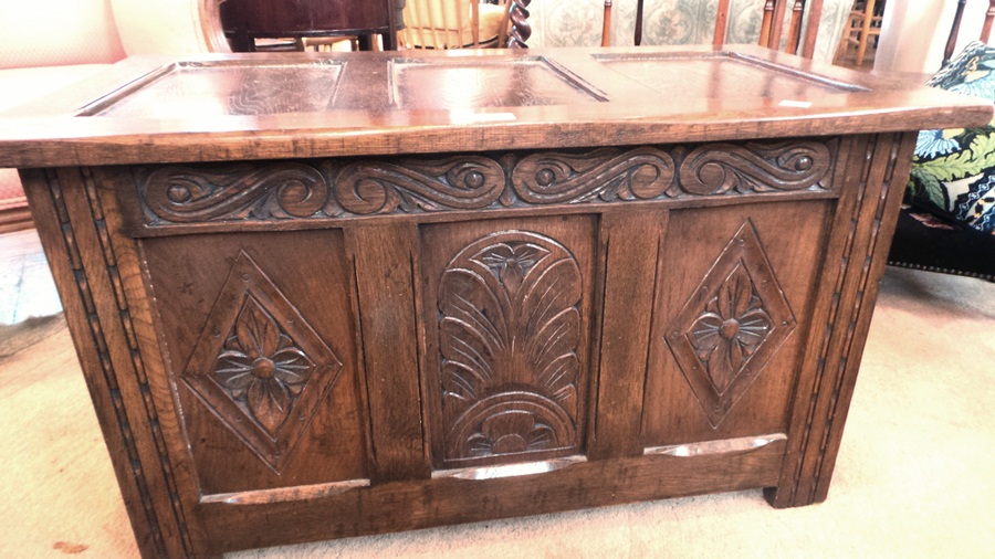 Reproduction oak triple-panel coffer having scroll and foliate carved front