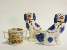 Pair reproduction Staffordshire blue and white pottery spaniels and pottery loving mug