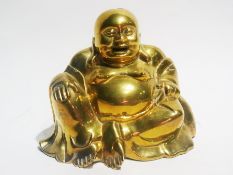 A brass model of Buddha, 22cm high