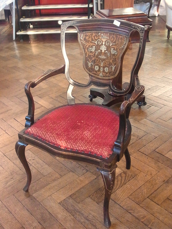 19th century inlaid mahogany open armchair, the shaped panel back inlaid with ivory satinwood on