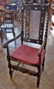 Set of eight Carolean-style oak caned back and seat dining chairs viz:- pair carvers and six