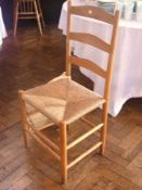 Set of four 20th century Arts & Crafts hardwood ladderback dining chairs each with rush seat, on