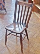 Set of six 20th century hardwood kitchen dining chairs each with lathe back elm seat, on turned