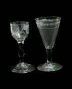 Old English cordial glass with ovoid-shaped bowl with foliate engraving, on a knopped stem, raised