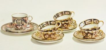 Six Royal Crown Derby teacups and saucers, Imari decorated, similar Imari china trio and similar