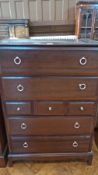 Stag Minstrel chest of four long and three short drawers