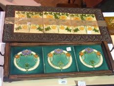 Edwardian oak tray inset three decorative earthenware tiles, framed set of three Art Nouveau tiles