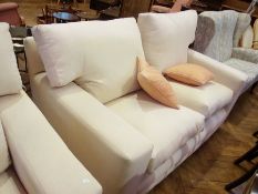 Modern cream three-piece suite viz:- two-seater sofa and two armchairs, all with square section