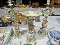 Meisson style continental porcelain candelabra garniture with centrepiece, each with mother and