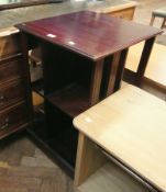 Polished wood revolving bookcase