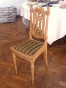 Painted wooden side chair with scroll carved top rail and light oak hall chair with pierced