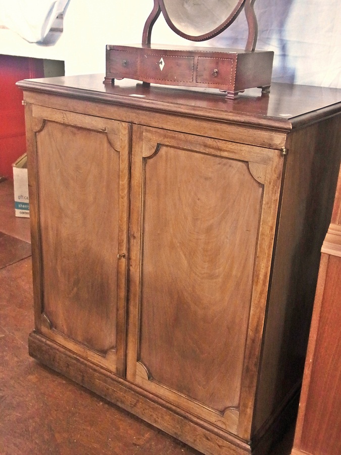 Mahogany cabinet fitted for television, having pair frame panel doors, single drawer to the
