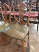 Set of eight reproduction Hepplewhite-style shield-back dining chairs viz:- seven standard and one