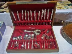 Silver plate canteen 'Community' by Oneida ( not complete), with a pair of silver plate berry spoons